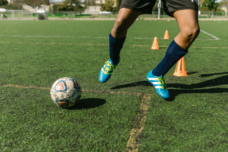 Soccer player dribbling